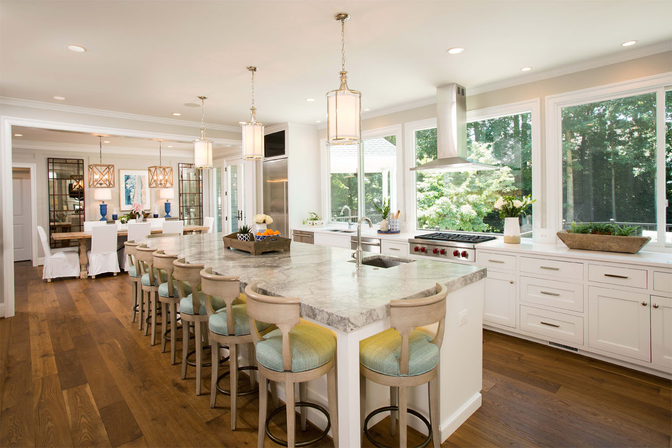 Renovated kitchen with white countertops and white cabinets